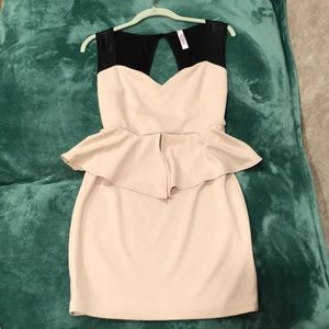 Beige peplum dress with peekaboo back
